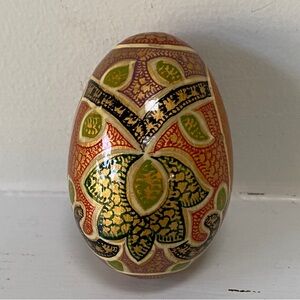 Handcrafted Decorative Wooden Egg with Intricate Patterns